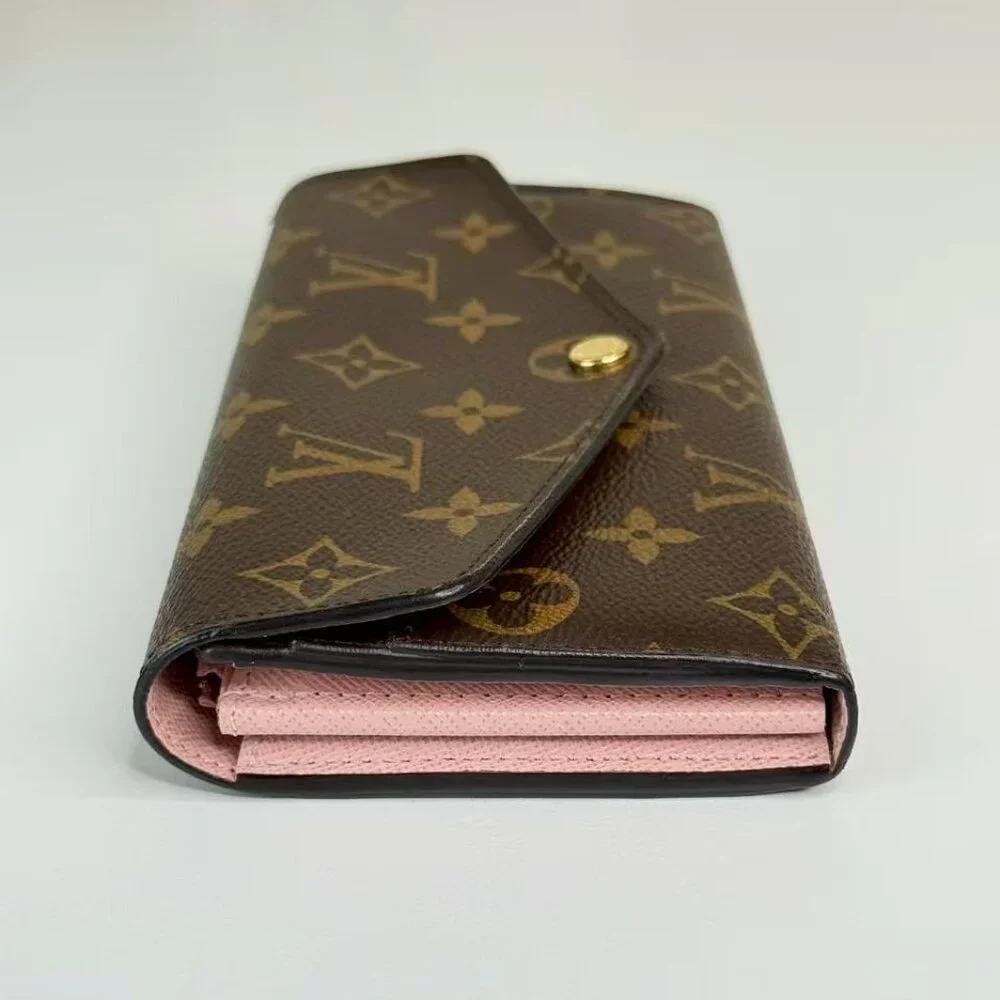 Louis Vuitton Monogram Canvas Wallet with Classic LV Logo Design